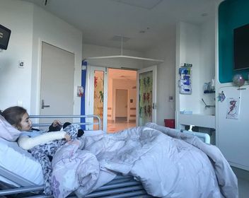 Ayla in her hospital bed
