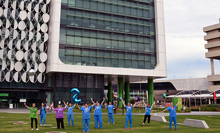 PCH staff outside the front of PCH with balloons