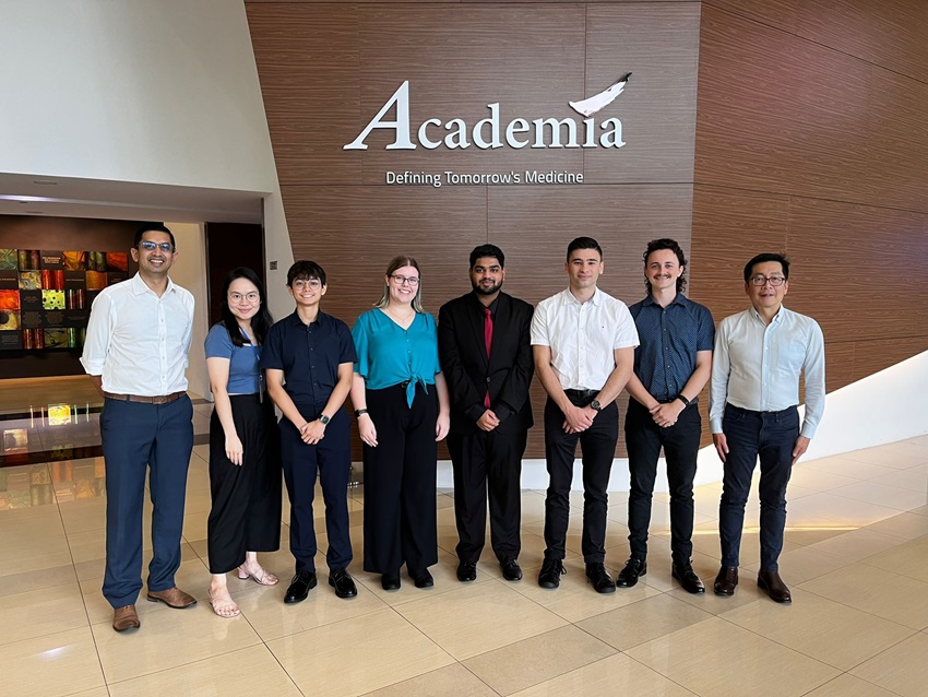 A group of student doctors standing at Academia: Defining Tomorrow's Medicine